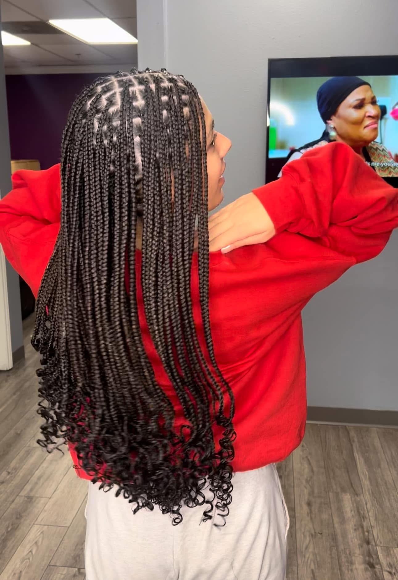 Knotless box braids with curly ends — back view